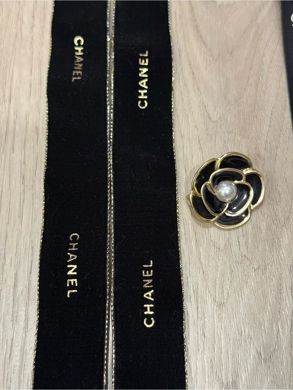CHANEL ribbons, charms, camellias
